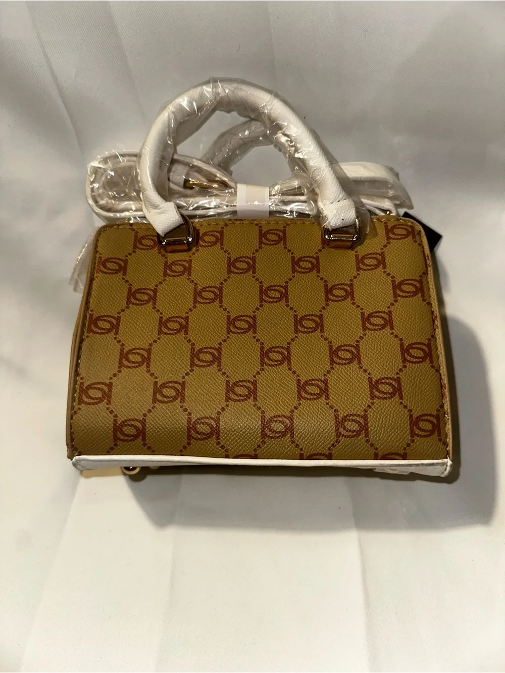 T484. Bebe Structured White & Brown Mini Satchel Handbag with crossbody Straps